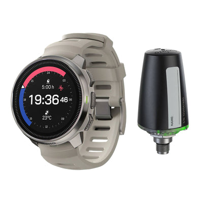 Suunto Ocean dive computer in sand with Suunto Tank POD