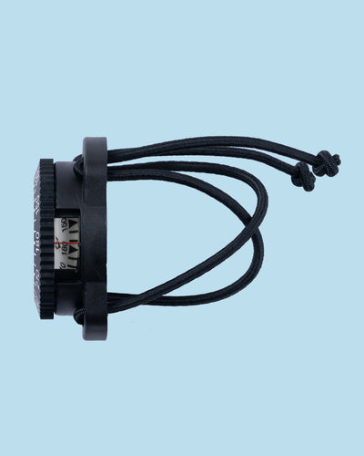 Side view of the Termo Industria bungee compass showing the side reading window