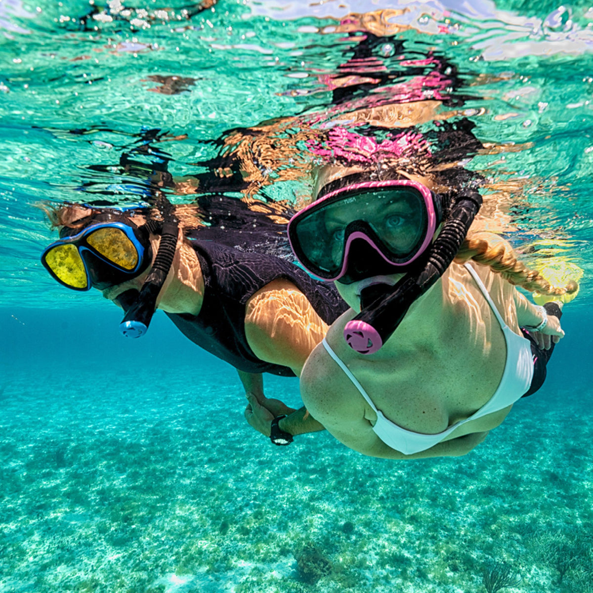 Tusa Serene adult travel set in black and hot pink: mask, dry snorkel and fins