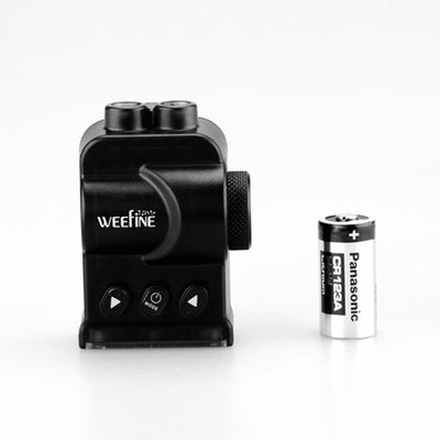 WeeFine WFA03 remote opened beside its CR123 battery