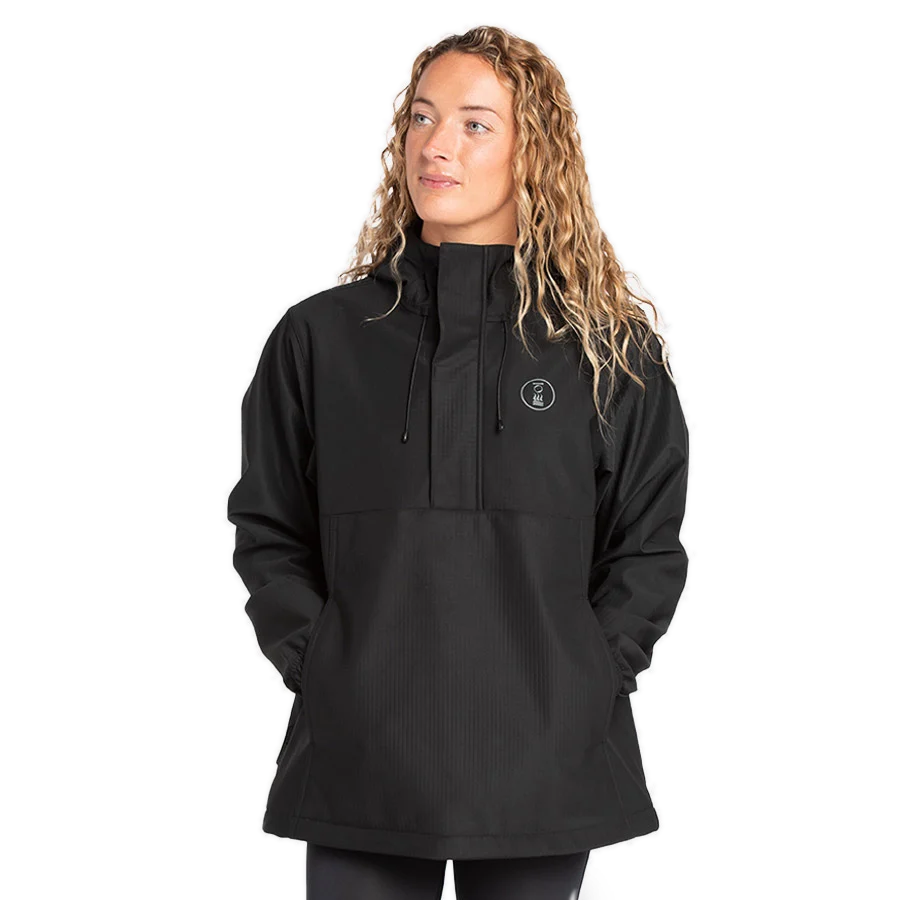 Women's Fourth Element windbreaker smock in black worn front on with the half zip and kangaroo pocket