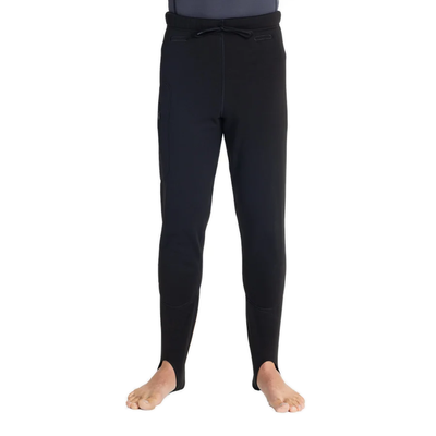 Men's Fourth Element Arctic leggings in black worn front on with the drawcord waist and stirrup feet